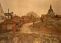 Stigbergsgatan (senare Sandbacksgatan) västerut mot Katarina kyrka 1922. I förgrunden den nedsprängda Renstiernas Gata.