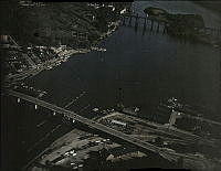 Flygbild över Liljeholmen med Liljeholmsbron, Hornstulls Strand och  Årstabron 1936.