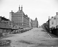 Kungsholmstorg. Till vänster Sankt Eriks bryggeri. Före år 1881 var namnet Stockholms Bryggeri AB.