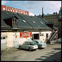 Blekingegatan 53. Gårdsinteriör vid C.A. Björkströms bilverkstad och bilplåtslageri.