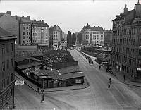 Vy från väster över skjulbebyggelse i kvarteret Gamen. Till vänster Åsögatan och till höger och Katarina Bangatan fram mot som korsningen Götgatan.