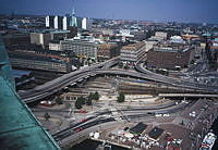 Vy från Stadshusets torn mot nordost över Tegelbacken, Centralstationen, Söderleden, Centralbron, Klara kyrka, Hötorgshusen, m.m.