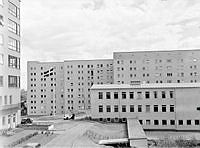 S:t Eriks nya sjuksköterskeskola och barnmoskeläroanstalt, en åtta våningars byggnad i anslutning till Södersjukhuset. Invigning.