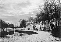 Tullhuset med Ålandsviken i förgrunden. Vinterlandskap.