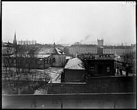 Helgeandsholmen från Lejonbacken. Norrbro t.h.