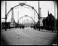 Norrbro från slottet mot Gustav Adolfs Torg med dekorationer med anledning av Oscar II:s 25 jubileum som kung.