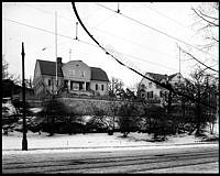 Djurgården vintertid. T.h. Verner von Heidenstams villa.