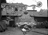 Skylt till Norrlandsbanken. 1911-1917 låg Norrlandsbanken på Fredsgatan i Klarakvarteren.