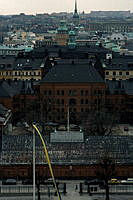 Utsikt från Hedvig Eleonora kyrka söderut. I förgrunden Kungliga Hovstallet. I fonden Södermalm.