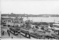 Vägarbeten på Östra Slussgatan. T.v. Karl Johans Torg. I fonden Skeppsholmen.