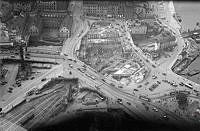 Flygbild österifrån över Slussen under arbete 1932.