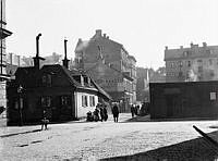 Rådmansgatan västerut från Stora Badstugatan, nuvarande Sveavägen. T.v. kv. Stormkransen.