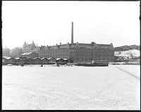 Separator industriområde vinteritd mot Klara Sjö och Pipersgatan. Mot SV.