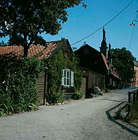 Stigbergsgatan 21-23 från sydväst. T.v. Blockmakarens hus.