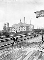 Utsikt från Centralstationen mot nordväst. Husen revs 1904. Dåv. kv. Braxen, senare Centralbangården och nuv. kv. Blekholmen.