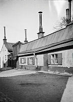 Parmmätargatan 8 och 10. Huset ägdes av Bolinders AB. Motsvarar nu läget mellan Kungsklippan 7 och 10.