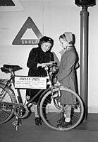 Götgatan 1, Stockholms Stadsmuseum. Polisutställning. Två flickor vid en cykel som är första pris i en ungdomstävling om trafik.