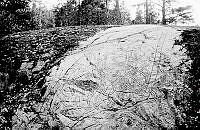 Runristning i fast häll