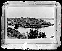 Foto av fotografi av Mälarvarvet på Långholmen från söder.