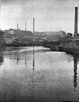 Motiv från Klara Sjö. I bakgrunden Bolinders fabriker.